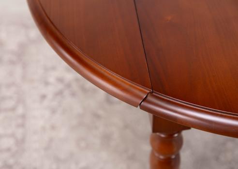 Table ronde à volets diamètre 90 cm réalisée en merisier massif de style Louis Philippe