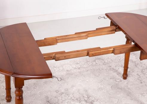 Table ronde à volets diamètre 90 cm réalisée en merisier massif de style Louis Philippe