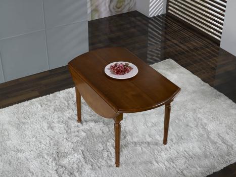 Table ronde à volets réalisée en Merisier Massif de style Louis XVI avec  2 allonges de 40 cm
