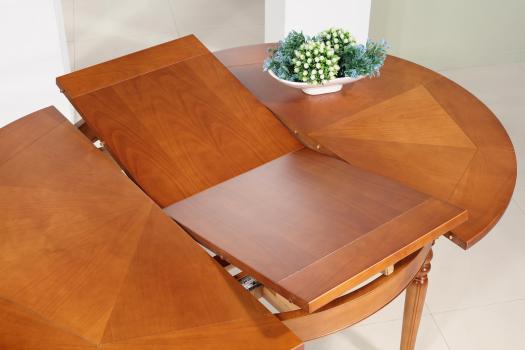 Table ronde Martine réalisée en Merisier Massif de style Louis Philippe, 4 pieds tournés Diamètre 120 1 allonge portefeuille de 50 cm 