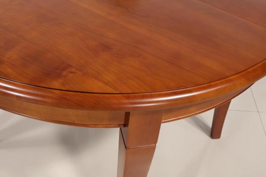 Table ronde 4 pieds Juliette, réalisée en Merisier Massif de style Louis Philippe 1 allonge portefeuille Diamètre 110 cm