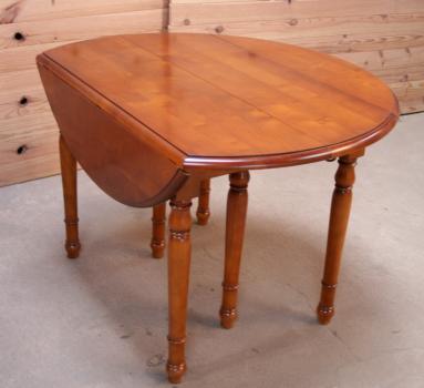 Table ronde à volets DIAMETRE 120 en merisier massif de style Louis philippe 3 allonges de 40 cm