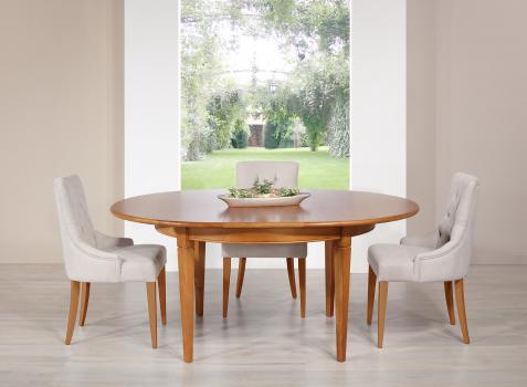 Table ronde Célia réalisée en merisier de style Directoire Diamètre 130 - 1 allonge incorporée rangée sous le plateau