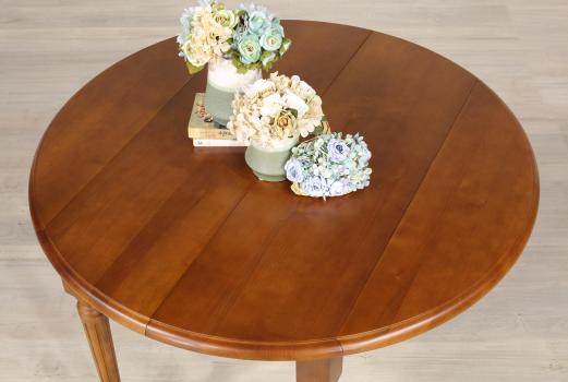 Table ronde à volets réalisée en Merisier Massif de style Louis XVI Diamètre 120 avec 10 allonges de 40 cm 
