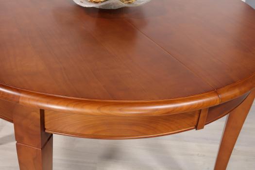 Table ronde 4 pieds sabres Camille, réalisée en merisier massif de style Louis Philippe DIAM.110 +  2 allonges de 40 cm 
